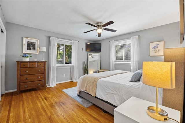 16 Trowbridge Trl, Pittsford, NY 14534 - bedroom with wood finished floors and a ceiling fan