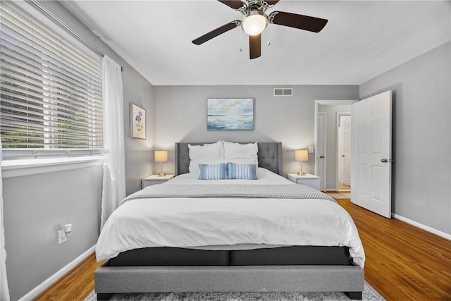 16 Trowbridge Trl, Pittsford, NY 14534 - bedroom with wood finished floors and a ceiling fan