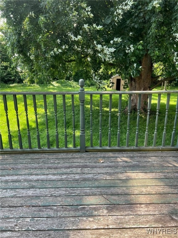 3980 Ridgelea Dr, Newfane, NY 14094 - deck featuring a lawn and a storage unit