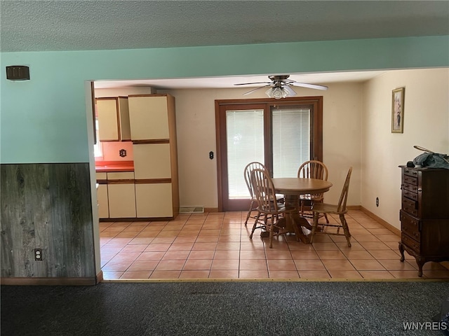 3980 Ridgelea Dr, Newfane, NY 14094 - dining room with a ceiling fan and light tile patterned floors