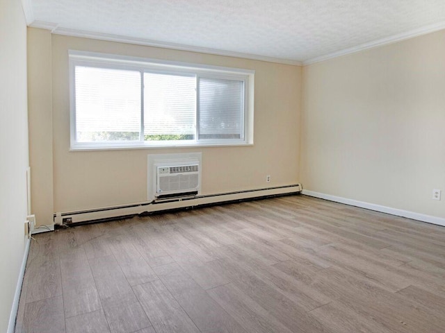 2432 E Ave Unit B, Brighton, NY 14610 - unfurnished room featuring wood finished floors, a wall unit AC, crown molding, and baseboard heating