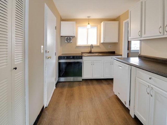 2432 E Ave Unit B, Brighton, NY 14610 - kitchen featuring electric range oven, white dishwasher, dark countertops, and dark wood finished floors