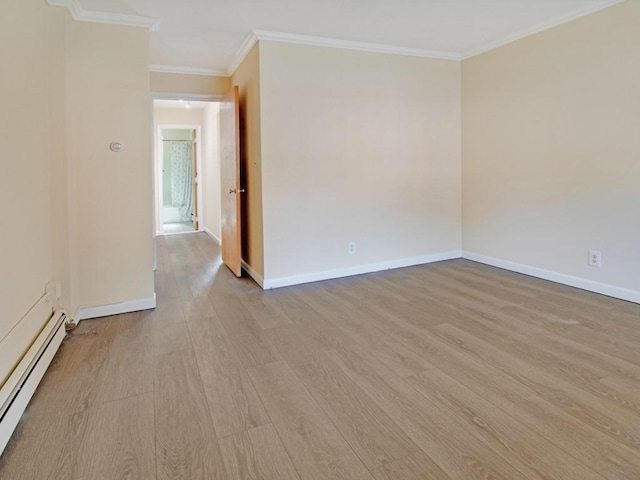 2432 E Ave Unit B, Brighton, NY 14610 - empty room featuring baseboard heating, wood finished floors, and crown molding