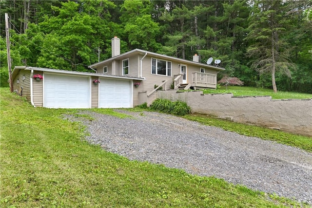 2332 Guyanoga Rd, Jerusalem, NY 14527 - view of front of home with a chimney, a garage, a wooden deck, and a front lawn