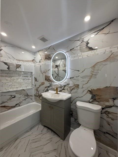 41 Garnet St, Rochester, NY 14609 - bathroom with vanity, marble finish flooring, tub / shower combination, stone wall, and tile walls