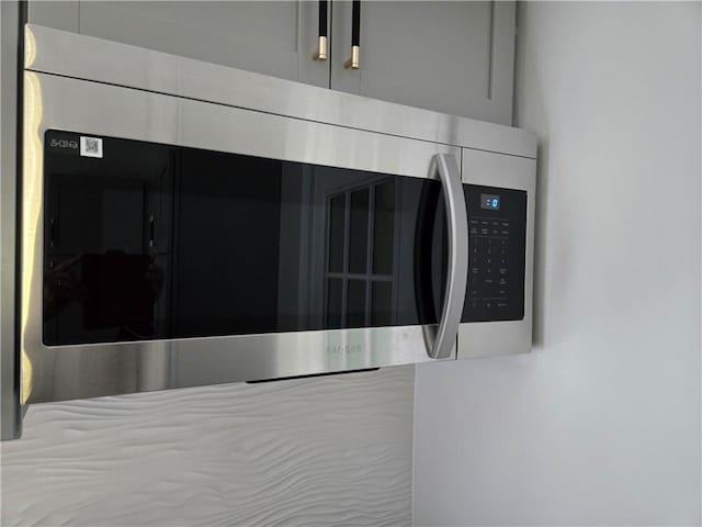 41 Garnet St, Rochester, NY 14609 - kitchen view of stainless steel microwave