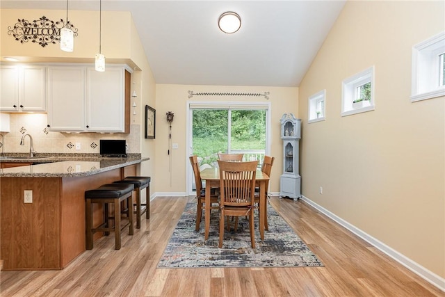 3919 N Park Way, Walworth, NY 14568 - dining room featuring light wood-style floors and lofted ceiling