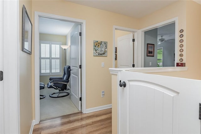 3919 N Park Way, Walworth, NY 14568 - corridor featuring light wood finished floors and baseboards