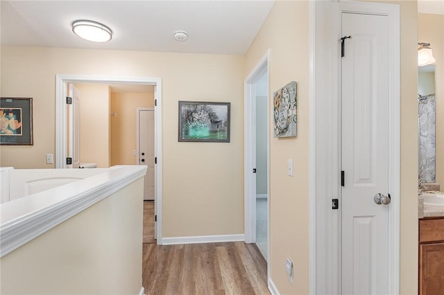 3919 N Park Way, Walworth, NY 14568 - corridor with light wood-style floors and baseboards
