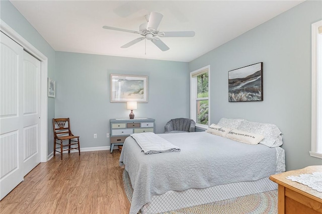 3919 N Park Way, Walworth, NY 14568 - bedroom featuring light wood-style flooring, a closet, and ceiling fan