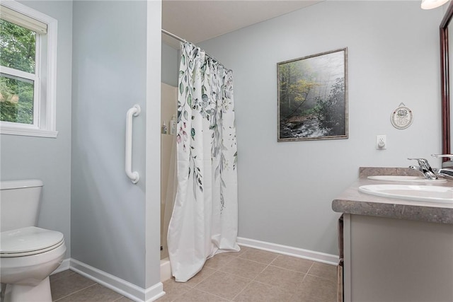 3919 N Park Way, Walworth, NY 14568 - bathroom featuring double vanity, curtained shower, and tile patterned floors