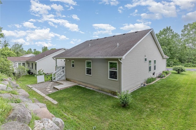 3919 N Park Way, Walworth, NY 14568 - rear view of house with a yard and roof with shingles