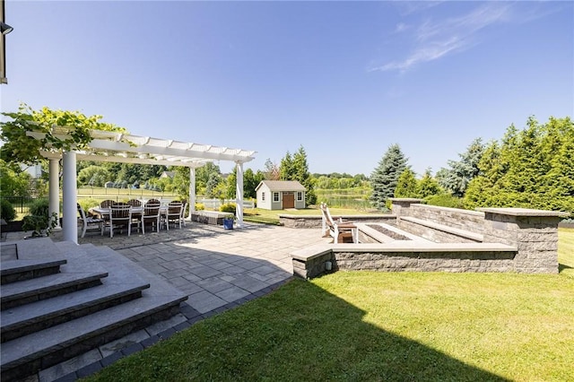 4 Crowne Pointe Dr, Penfield, NY 14526 - view of yard with a patio area, a storage shed, outdoor dining space, and a pergola