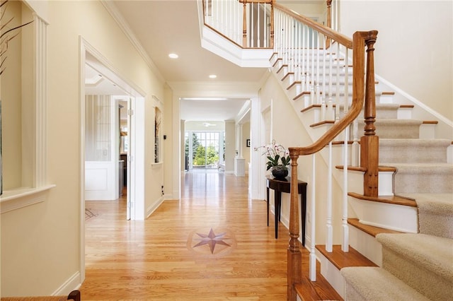 4 Crowne Pointe Dr, Penfield, NY 14526 - entryway with light wood-type flooring, ornamental molding, stairway, and recessed lighting
