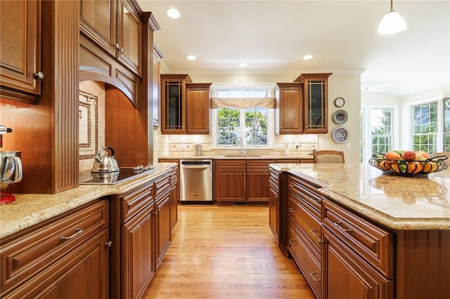 4 Crowne Pointe Dr, Penfield, NY 14526 - kitchen featuring dishwasher, light wood-type flooring, light stone countertops, backsplash, and crown molding