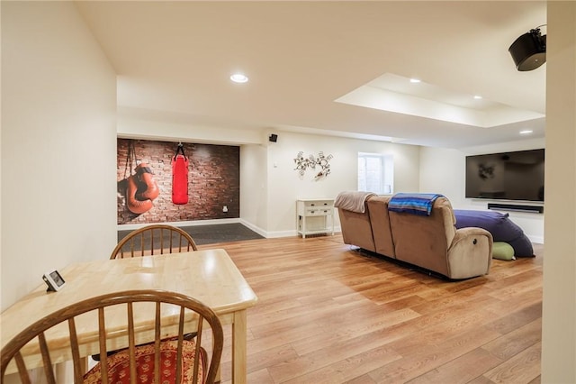 4 Crowne Pointe Dr, Penfield, NY 14526 - living area with light wood finished floors, recessed lighting, and a raised ceiling