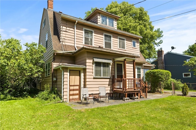 29 Stonehenge Rd, Irondequoit, NY 14609 - rear view of property featuring a chimney