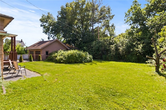29 Stonehenge Rd, Irondequoit, NY 14609 - view of green lawn featuring a patio area
