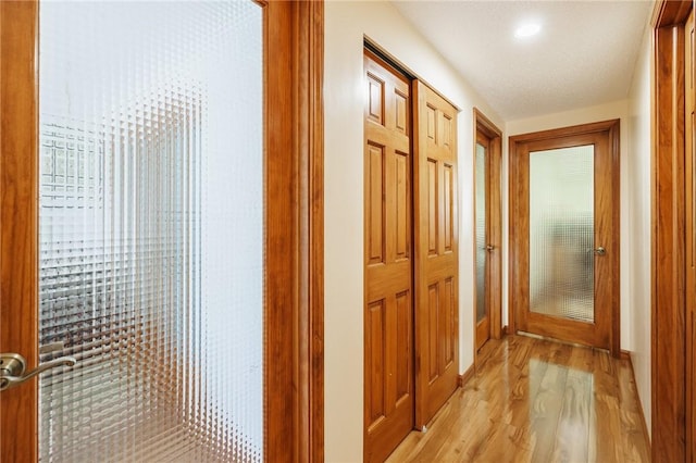 18 Chesterton Ct, Perinton, NY 14450 - hall featuring light wood-style floors and baseboards