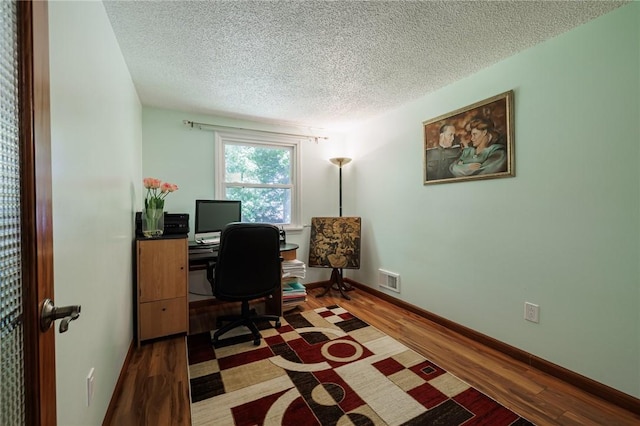 18 Chesterton Ct, Perinton, NY 14450 - office area featuring a textured ceiling and wood finished floors