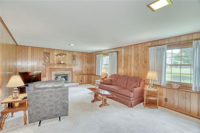 53 Eileen Dr, Greece, NY 14616 - carpeted living area featuring wooden walls and a fireplace