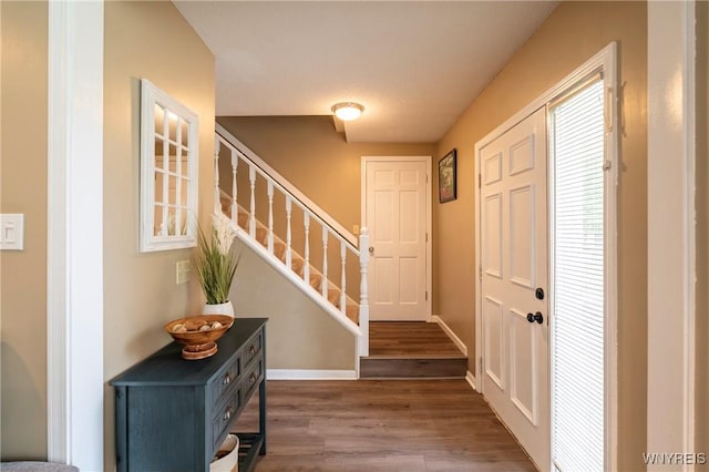 278 Shady Grove Dr, Amherst, NY 14051 - entrance foyer with wood finished floors and stairs