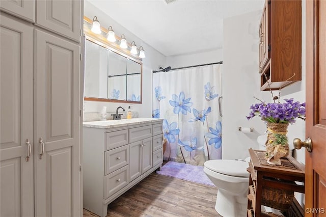 55 Ainslee Dr, Schroeppel, NY 13132 - full bathroom with vanity, wood finished floors, and curtained shower