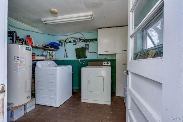 44420 Butterfield, Alexandria, NY 13607 - washroom with water heater, washing machine and dryer, and cabinet space