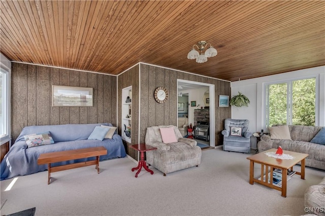 44420 Butterfield, Alexandria, NY 13607 - carpeted living area with wood ceiling, plenty of natural light, and wood walls
