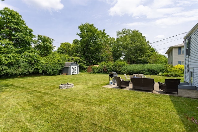 196 Saint Johns Dr, Greece, NY 14626 - view of green lawn with an outdoor living space with a fire pit, a patio area, and a storage unit