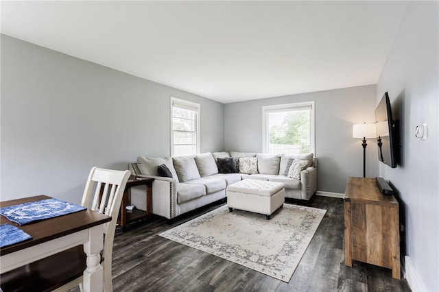 196 Saint Johns Dr, Greece, NY 14626 - living area with dark wood-style flooring and baseboards