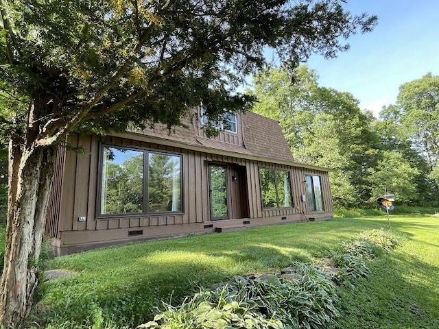 22869AND22871 State Highway 23, Harpersfield, NY 13786 - rear view of property featuring crawl space, a lawn, and a shingled roof