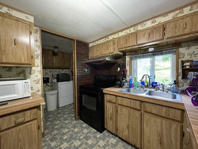 22869AND22871 State Highway 23, Harpersfield, NY 13786 - kitchen featuring black electric range oven, white microwave, washer / dryer, under cabinet range hood, and light countertops
