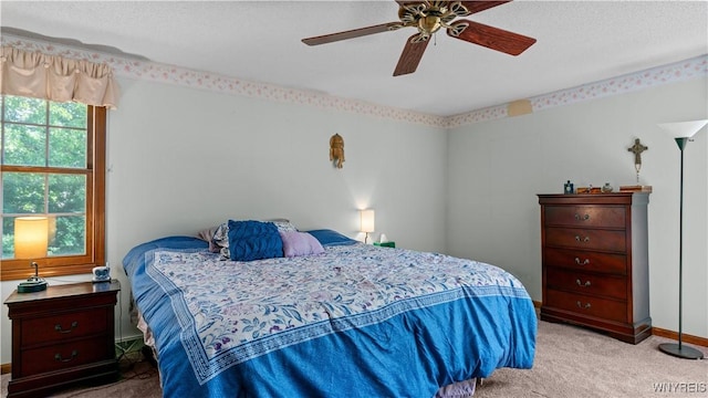131 Daven Dr, Amherst, NY 14068 - carpeted bedroom featuring a ceiling fan and a textured ceiling
