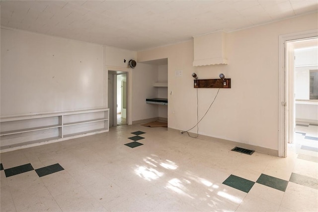 2429 English Rd, Greece, NY 14616 - empty room with tile patterned floors and baseboards