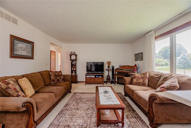112 Pin Oak Ln, Irondequoit, NY 14622 - living room featuring light colored carpet