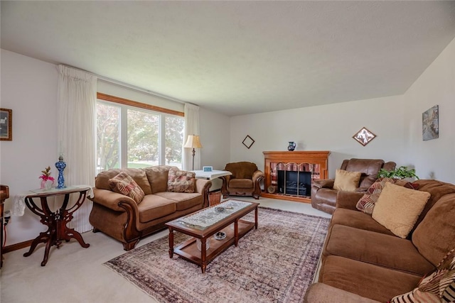 112 Pin Oak Ln, Irondequoit, NY 14622 - living area with light carpet and a fireplace with raised hearth