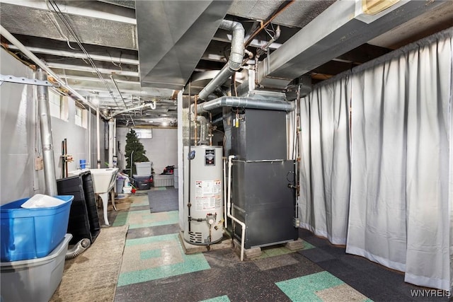47 Waverly Ave, Tonawanda, NY 14217 - unfinished below grade area featuring water heater and heating unit