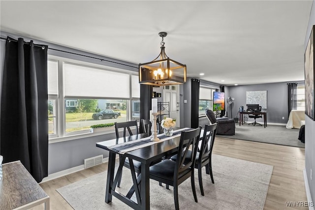 47 Waverly Ave, Tonawanda, NY 14217 - dining space featuring a chandelier, recessed lighting, and light wood-style floors