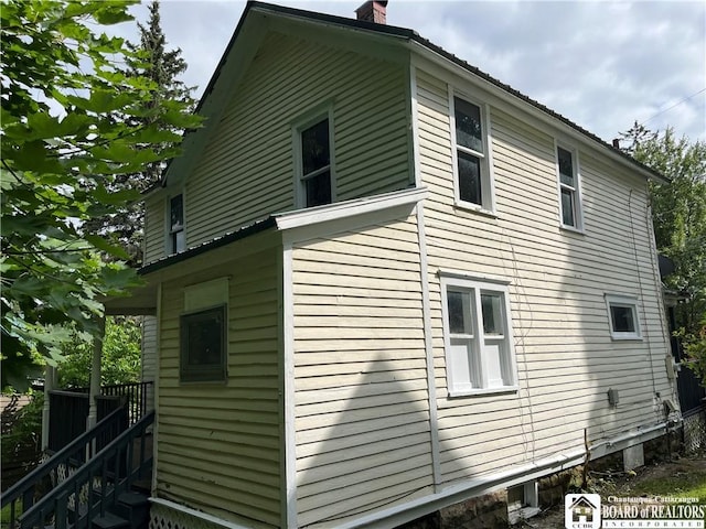 14 Dearing Ave, Jamestown, NY 14701 - view of home's exterior featuring a chimney