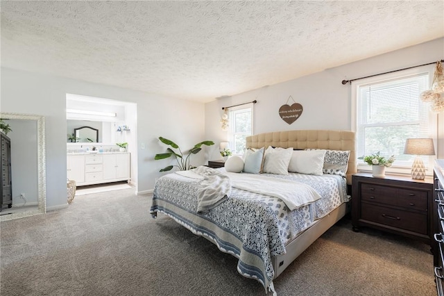 346 Willowood Dr, Greece, NY 14612 - bedroom featuring multiple windows, dark carpet, ensuite bath, and a textured ceiling