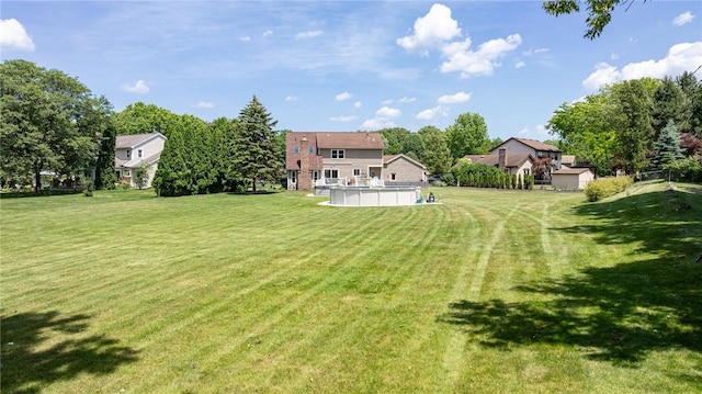 346 Willowood Dr, Greece, NY 14612 - view of green lawn with an outdoor pool