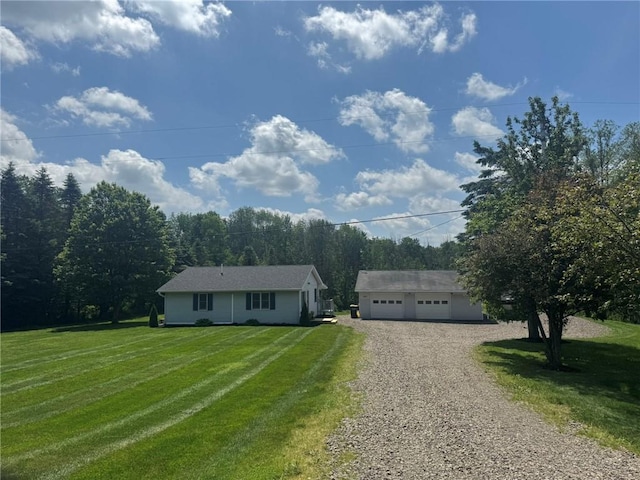 504 Whites Hill Rd, Guilford, NY 13780 - ranch-style house with an outbuilding, a front lawn, and a detached garage