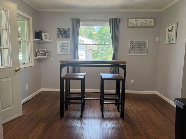 504 Whites Hill Rd, Guilford, NY 13780 - dining space featuring dark wood finished floors and crown molding