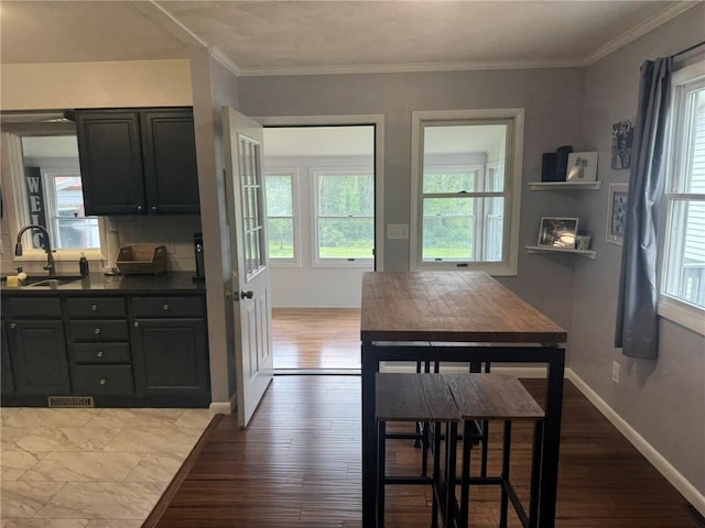 504 Whites Hill Rd, Guilford, NY 13780 - dining room with hardwood / wood-style floors and crown molding