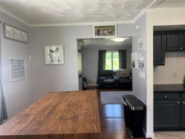 504 Whites Hill Rd, Guilford, NY 13780 - dining room featuring wood finished floors and ornamental molding