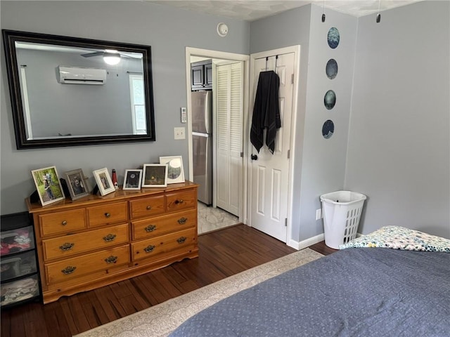 504 Whites Hill Rd, Guilford, NY 13780 - bedroom with wood finished floors, freestanding refrigerator, and a wall mounted AC