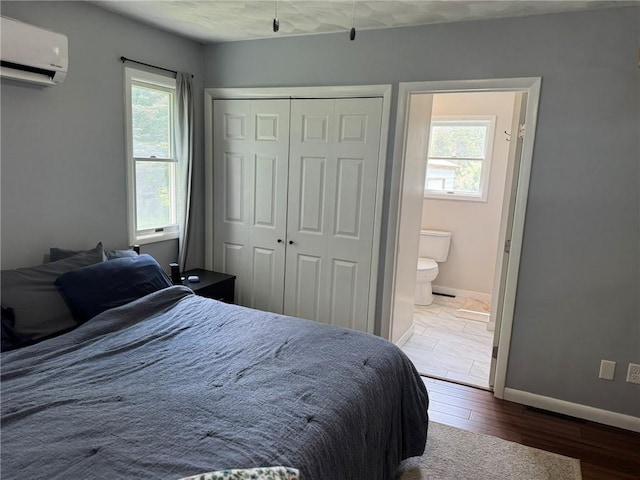 504 Whites Hill Rd, Guilford, NY 13780 - bedroom featuring a wall mounted AC, multiple windows, wood finished floors, and a closet