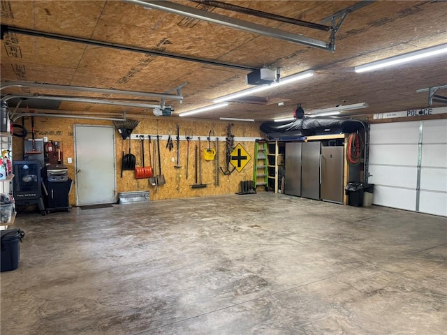 504 Whites Hill Rd, Guilford, NY 13780 - garage featuring a garage door opener