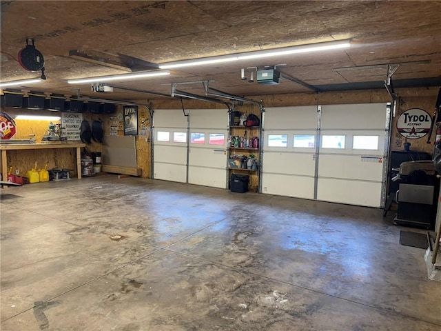 504 Whites Hill Rd, Guilford, NY 13780 - garage featuring a garage door opener